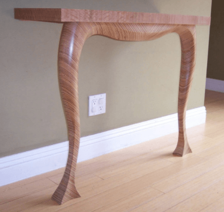 Modern Table Sculpted from Scraps of Plywood